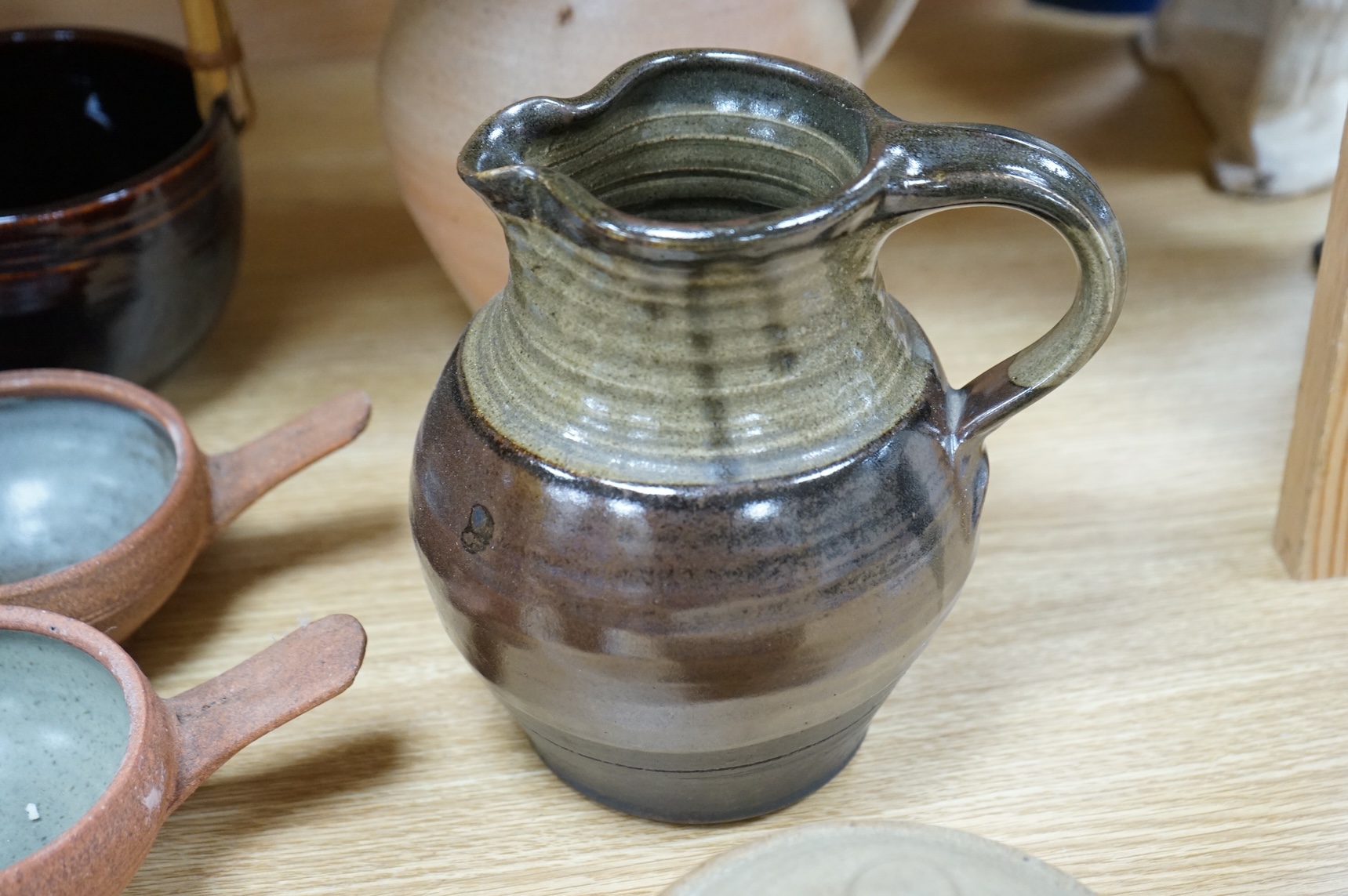 A large group of 20th century signed and unsigned Studio pottery, tallest 23cm high